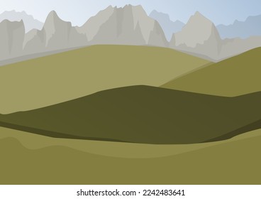 Green gentle hills and sharp gray mountains