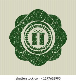  Green gift box icon inside distress rubber grunge stamp