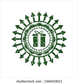 Green gift box icon inside distress rubber grunge stamp