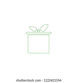 Green gift in a linear style. Vector graphics.