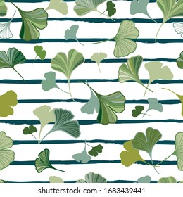 Green ginkgo leaves on the stripes seamless pattern