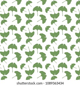 Green  ginkgo leaves on white background pattern. 
