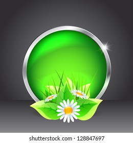 Green glass button with flowers on a black background