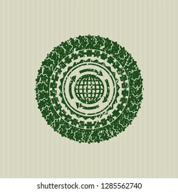 Green globalization icon inside distress rubber seal with grunge texture