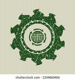 Green globalization icon inside rubber grunge texture stamp