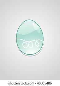 green glossy easter egg with grey background