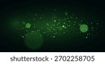 Green glowing particles on dark background