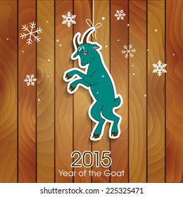 Green goat decoration on a wooden background. New Year vector illustration