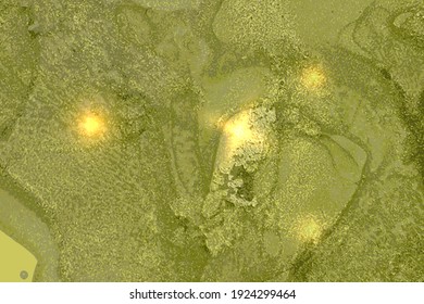 Green and gold abstract marble background with sparkles. Vector texture in alcohol ink technique with glitter. Template for banner, poster design. Fluid art painting