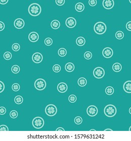Green Gold coin with four leaf clover icon isolated seamless pattern on green background. Happy Saint Patricks day.  Vector Illustration