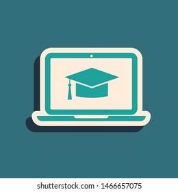 Green Graduation Cap On Screen Laptop Icon Isolated On Blue Background. Online Learning Or E-learning Concept. Long Shadow Style. Vector Illustration