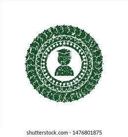 Green graduation icon inside distress rubber stamp