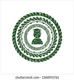 Green graduation icon inside distressed rubber stamp
