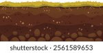 Green grass growing on brown soil layers with visible roots and rocks, representing a healthy and fertile ground perfect for agriculture and gardening