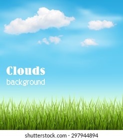 Green Grass Lawn with Clouds on Light Blue Sky