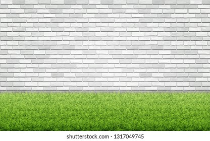 Green grass lawn on white brick wall background. Spring card blank. Backyard or front garden.