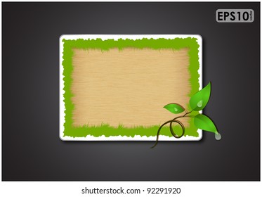 Green grass plate with sprout on black background