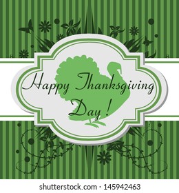 Green greeting with flowers, turkey shape and the text Happy Thanksgiving Day written in the middle of the image