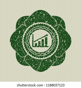 Green growth chart icon inside rubber stamp with grunge texture