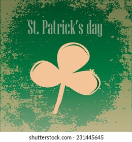 a green grunge background with a clover and text for patrick's day