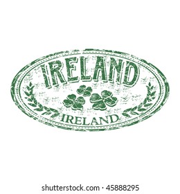 Green grunge rubber stamp with four leaf clovers and the name of Ireland written inside the stamp