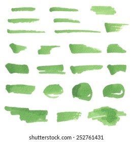 Green hand drawn watercolor marker strokes and stains on white background. Vector set sketched design elements for banner, scrapbook, craft, card, poster. Brush texture painted abstract illustration. 