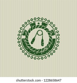 Green hand gripper icon inside distress with rubber seal texture
