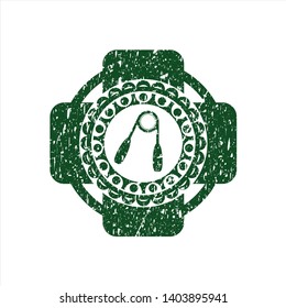 Green hand gripper icon inside distressed rubber grunge stamp