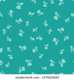 Green Hand holding deck of playing cards icon isolated seamless pattern on green background. Casino gambling.  Vector Illustration