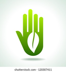 Green hand with green leaf over white background. vector