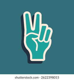 Green Hand showing two finger icon isolated on green background. Hand gesture V sign for victory or peace. Long shadow style. Vector