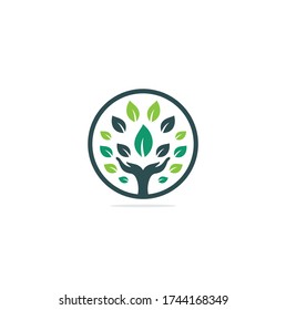Green hand tree logo design. Natural products logo. Hand tree logo design