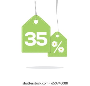 Green hanging price tag labels with 35% and a daisy flower design texts on them and with shadow isolated on white background. For summer sale campaigns.