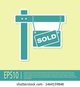 Green Hanging sign with text Sold icon isolated on yellow background. Sold sticker. Sold signboard.  Vector Illustration