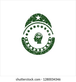 Green head with gears inside icon inside distress rubber grunge seal
