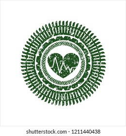 Green heart with electrocardiogram icon inside rubber stamp