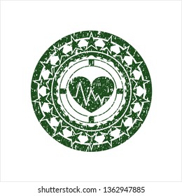 Green heart with electrocardiogram icon inside distress rubber stamp with grunge texture