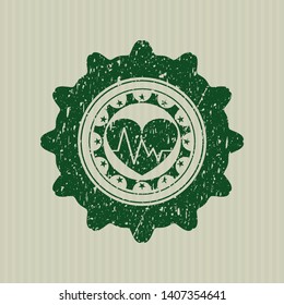 Green heart with electrocardiogram icon inside distress grunge seal