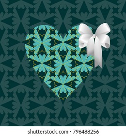 Green heart with a white bow