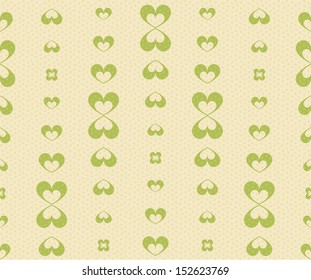 Green hearts on a beige background