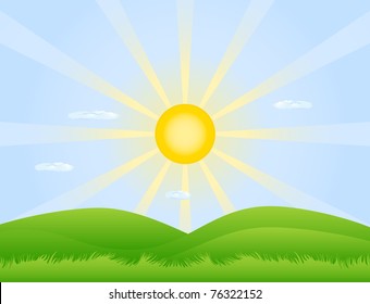 Green hills covered with grass and the rising sun