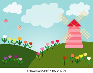 Green hills are full of many colors tulips along with wind turbine and small butterfly are flying in the sky bright full of white clouds.