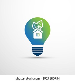 Green Home, Eco Energy Concept Icon Design - House and Green Leaves Inside a Light Bulb 