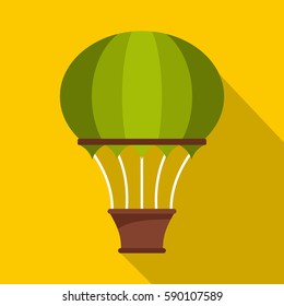 Green hot air balloon icon. Flat illustration of green hot air balloon vector icon for web isolated on yellow background