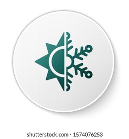 Green Hot and cold symbol. Sun and snowflake icon isolated on white background. Winter and summer symbol. White circle button. Vector Illustration