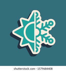 Green Hot and cold symbol. Sun and snowflake icon isolated on blue background. Winter and summer symbol. Long shadow style. Vector Illustration