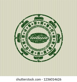 Green hot dog icon inside distress rubber seal with grunge texture