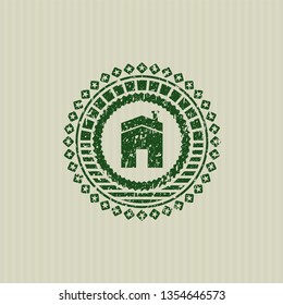 Green house icon inside distress rubber stamp