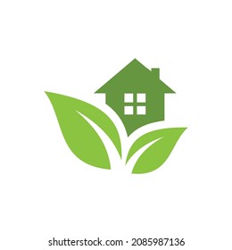 Green House With Leaves Vector Logo Icon. Eco Friendly Energy Efficient Home Symbol.