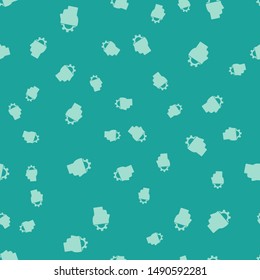 Green Human with gear inside icon isolated seamless pattern on green background. Artificial intelligence. Thinking brain sign. Symbol work of brain.  Vector Illustration